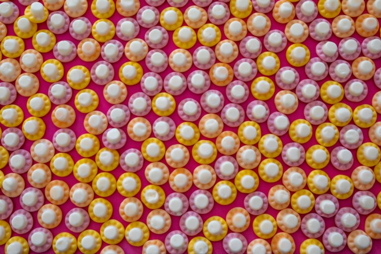 Bright candy-colored grid representing match-3 game tiles