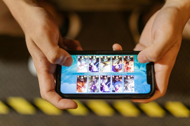 Smartphone displaying a colorful blocky game environment